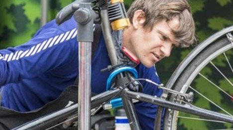 Man Fixing Bike